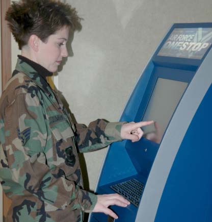 Senior Airman Vicki Cummings Using the OneStop Kiosk