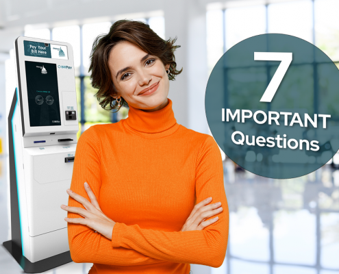 A woman standing in an office with a DynaTouch BillPay Kiosk behind her. Overlaid text says: "7 Important Questions"